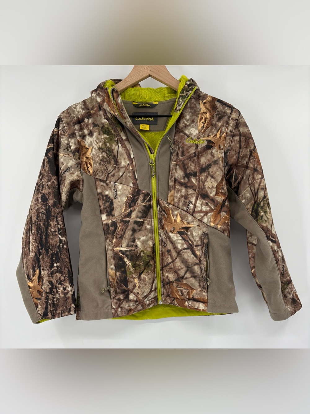 Cabela’s Youth M Zonz Woodlands Camo Fleece Hooded Hunting Jacket